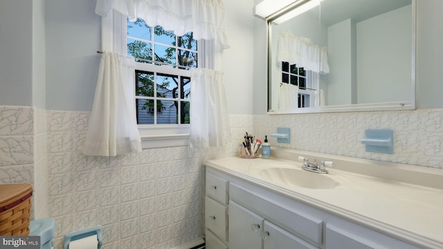 1226 Brownsville Rd, Feasterville Trevose, PA 19053 - bathroom featuring tile walls, vanity, a wainscoted wall, and a tub