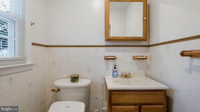 1226 Brownsville Rd, Feasterville Trevose, PA 19053 - bathroom featuring tile walls, vanity, and a wainscoted wall