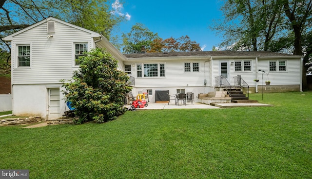 1226 Brownsville Rd, Feasterville Trevose, PA 19053 - rear view of property with a lawn and a patio area