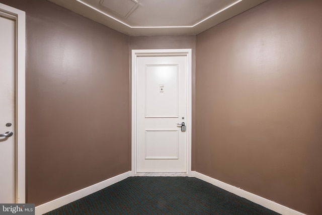 100 Harborview Dr Unit 212, Baltimore, MD 21230 - doorway featuring dark colored carpet and baseboards