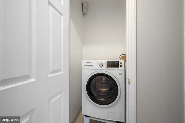 100 Harborview Dr Unit 212, Baltimore, MD 21230 - laundry room featuring washer / clothes dryer