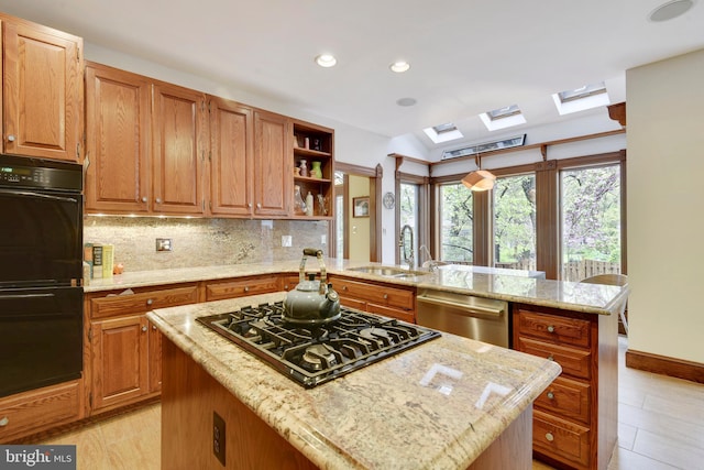 307 Shadow Walk, Falls Church, VA 22046 - kitchen featuring gas stovetop, dishwasher, a skylight, a peninsula, and recessed lighting