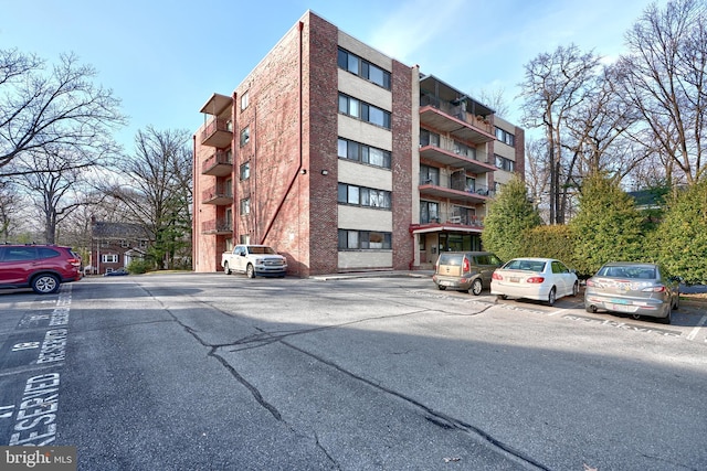 8308 Flower Ave Unit 401, Takoma Park, MD 20912 - view of apartment building / complex with uncovered parking