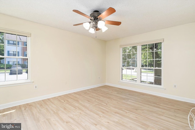 49 Joyner Ct, Lawrence, NJ 08648 - spare room featuring wood finished floors, ceiling fan, and a textured ceiling