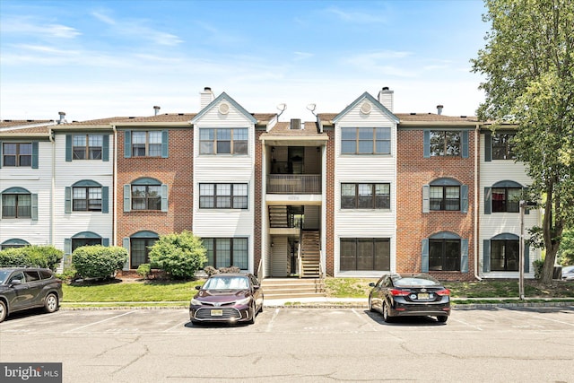 49 Joyner Ct, Lawrence, NJ 08648 - view of building exterior with uncovered parking