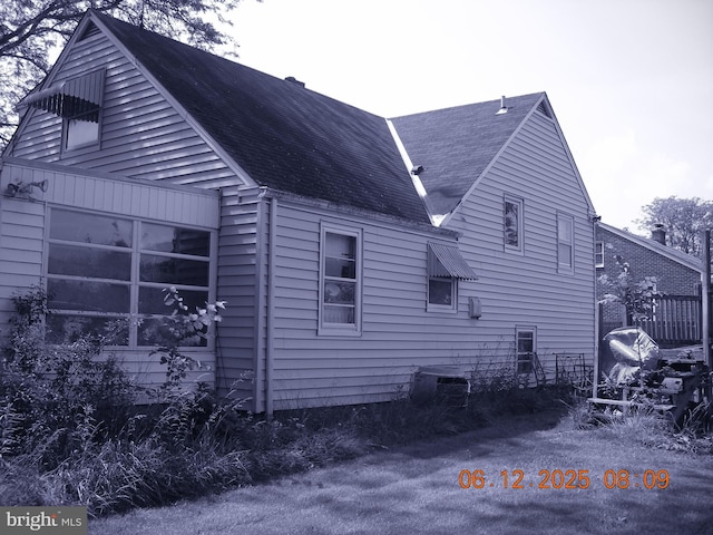 63 N Main St, Quakertown, PA 18951 - view of property exterior with a central AC unit