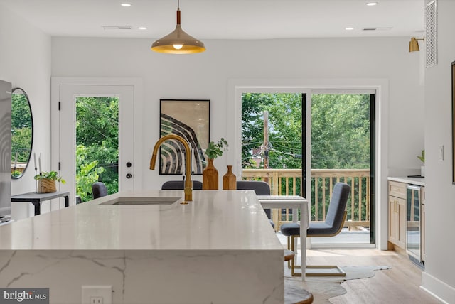 4308 4th St NW, Washington, DC 20011 - dining area with light wood-type flooring, recessed lighting, and wine cooler