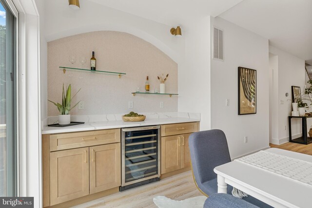 4308 4th St NW, Washington, DC 20011 - indoor wet bar with wine cooler and light wood-style floors
