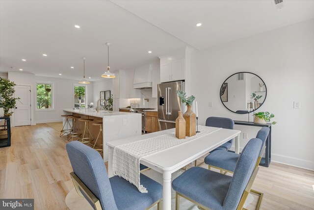 4308 4th St NW, Washington, DC 20011 - dining space featuring light wood-type flooring and recessed lighting