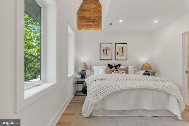 4308 4th St NW, Washington, DC 20011 - bedroom with multiple windows, light wood-style flooring, and recessed lighting
