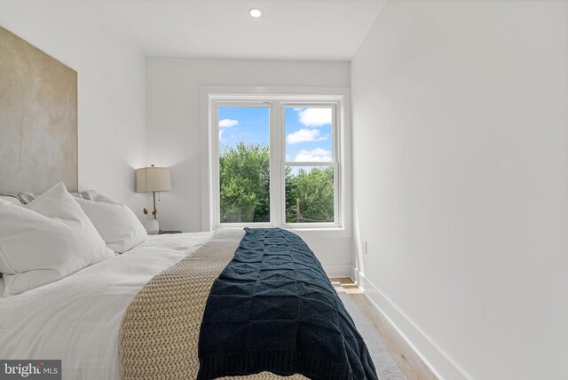 4308 4th St NW, Washington, DC 20011 - bedroom with multiple windows, light wood-style flooring, and recessed lighting
