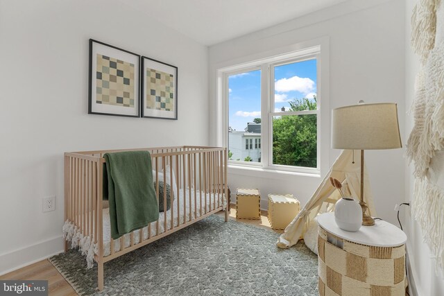 4308 4th St NW, Washington, DC 20011 - bedroom featuring wood finished floors and baseboards