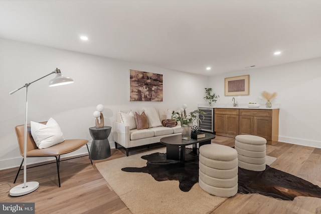 4308 4th St NW, Washington, DC 20011 - living area with wine cooler, wet bar, recessed lighting, and light wood-style floors