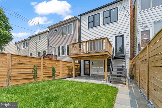 4308 4th St NW, Washington, DC 20011 - rear view of property with a fenced backyard, a patio area, stairway, and a wooden deck