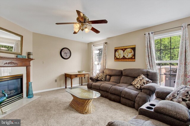 2785 Sparrow Dr, York, PA 17408 - carpeted living area featuring ceiling fan and a fireplace with flush hearth