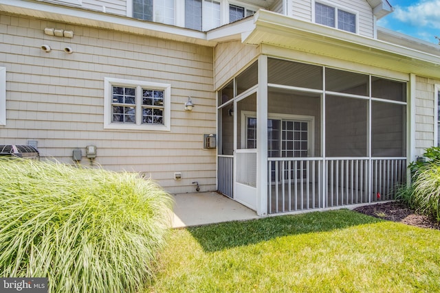 19967 Sandy Bottom Cir Unit 103, Rehoboth Beach, DE 19971 - view of exterior entry with a yard