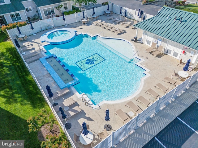 19967 Sandy Bottom Cir Unit 103, Rehoboth Beach, DE 19971 - community pool featuring a community hot tub and a patio