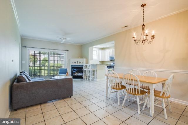 19967 Sandy Bottom Cir Unit 103, Rehoboth Beach, DE 19971 - dining room featuring a chandelier, crown molding, ceiling fan, light tile patterned floors, and a glass covered fireplace