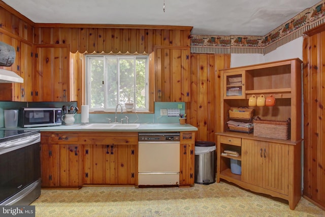 8029 Molly Pitcher Hwy, Shippensburg, PA 17257 - kitchen with appliances with stainless steel finishes, light countertops, brown cabinets, under cabinet range hood, and light flooring