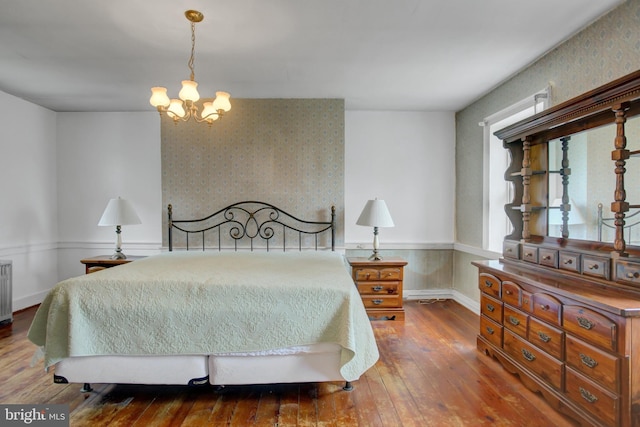 8029 Molly Pitcher Hwy, Shippensburg, PA 17257 - bedroom with hardwood / wood-style floors, wallpapered walls, and a chandelier