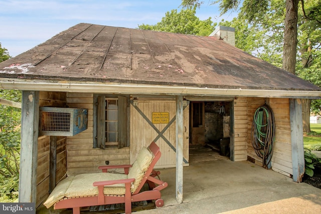 8029 Molly Pitcher Hwy, Shippensburg, PA 17257 - view of home's exterior with a chimney, an exterior structure, and an outbuilding