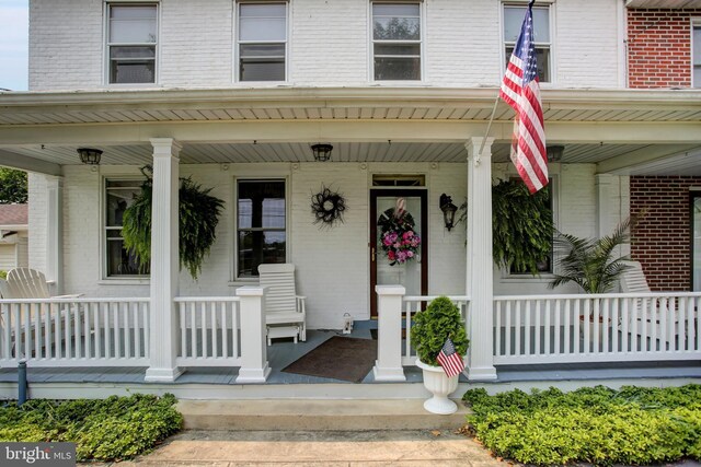 8029 Molly Pitcher Hwy, Shippensburg, PA 17257 - entrance to property with covered porch and brick siding