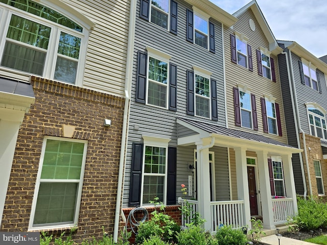 18316 Reaper Hill Ct, Triangle, VA 22172 - view of front of home with covered porch and brick siding