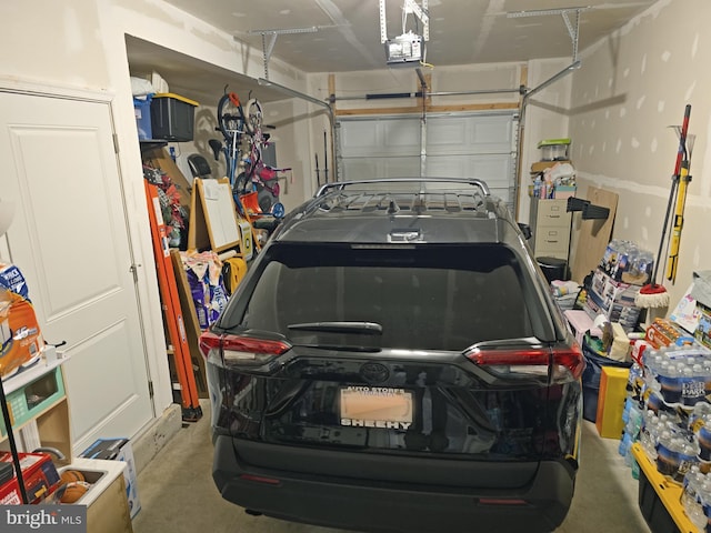 18316 Reaper Hill Ct, Triangle, VA 22172 - garage featuring a garage door opener