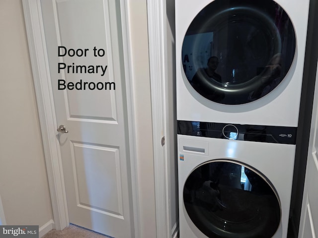 18316 Reaper Hill Ct, Triangle, VA 22172 - laundry room with stacked washer / dryer