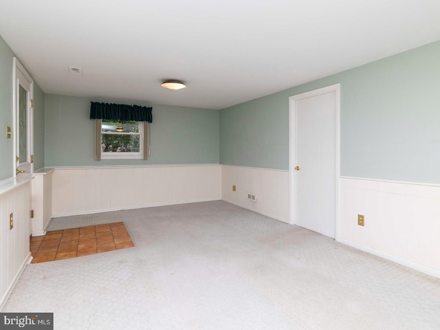 2868 Senak Rd, Abington, PA 19001 - carpeted empty room featuring a wainscoted wall