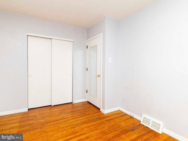 2868 Senak Rd, Abington, PA 19001 - unfurnished bedroom with wood finished floors and a closet