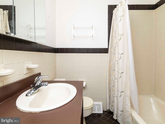 2868 Senak Rd, Abington, PA 19001 - bathroom featuring tile walls, shower / tub combo with curtain, tile patterned flooring, a wainscoted wall, and vanity