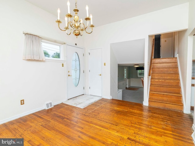2868 Senak Rd, Abington, PA 19001 - entrance foyer featuring a chandelier, stairway, and hardwood / wood-style flooring