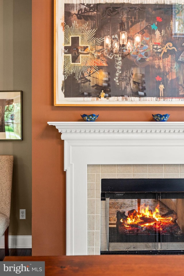 1 Ralph Marsh Dr, Glen Mills, PA 19342 - detailed view of a tiled fireplace and baseboards