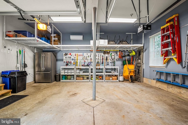 1 Ralph Marsh Dr, Glen Mills, PA 19342 - garage featuring freestanding refrigerator and a garage door opener