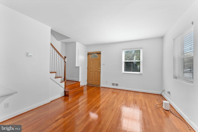 733 S Fayette St, Alexandria, VA 22314 - spare room with light wood-style floors and stairs