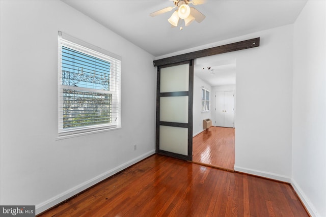 733 S Fayette St, Alexandria, VA 22314 - unfurnished room with plenty of natural light, dark wood-style flooring, and a ceiling fan