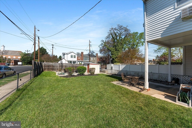 733 S Fayette St, Alexandria, VA 22314 - fenced backyard featuring a storage unit and a patio area