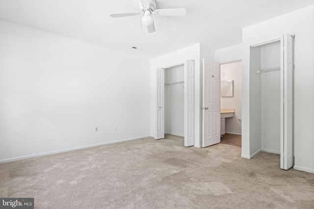 31 Beagle Run Unit 88, Nottingham, MD 21236 - unfurnished bedroom with carpet floors, connected bathroom, a ceiling fan, and a closet