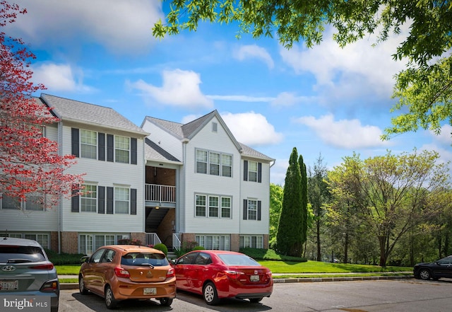 31 Beagle Run Unit 88, Nottingham, MD 21236 - view of building exterior with uncovered parking