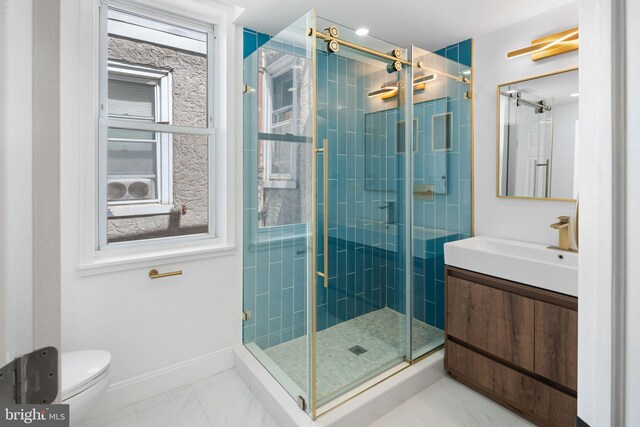 2617 E Norris St, Philadelphia, PA 19125 - bathroom with vanity, a shower stall, and marble finish floors