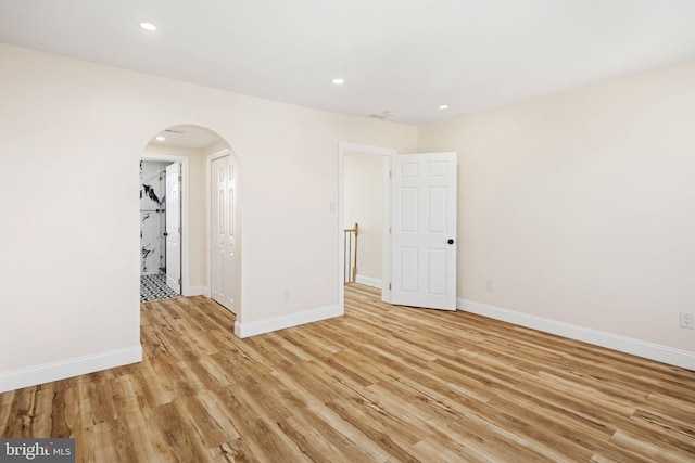 2617 E Norris St, Philadelphia, PA 19125 - spare room featuring arched walkways, light wood finished floors, and recessed lighting