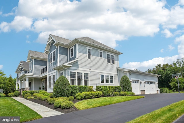 41550 Hepatica Ct, Ashburn, VA 20148 - view of front of house with a front lawn, an attached garage, and driveway