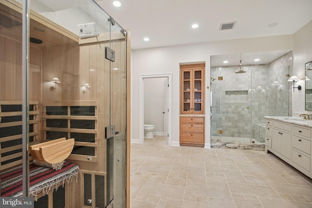41550 Hepatica Ct, Ashburn, VA 20148 - full bath with a sauna / steam room, a stall shower, vanity, and recessed lighting
