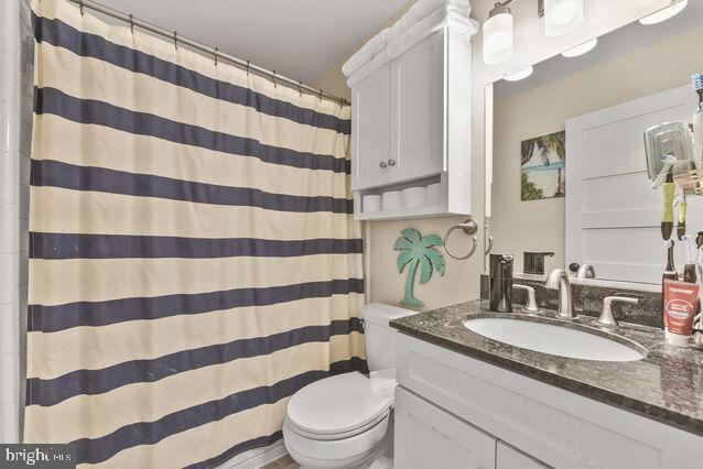 32 Hamilton Terrace Dr, Hamilton, VA 20158 - full bathroom with vanity and a shower with shower curtain
