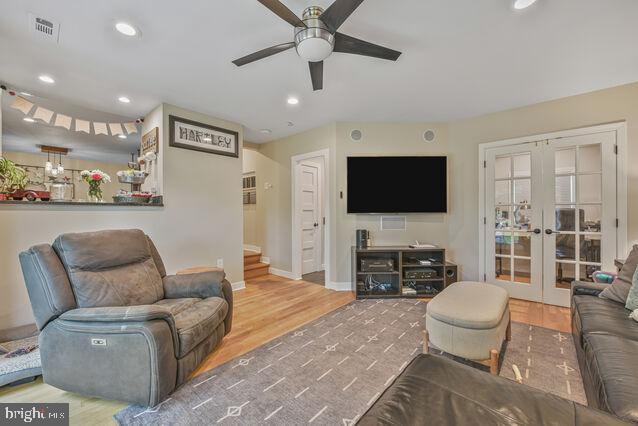 32 Hamilton Terrace Dr, Hamilton, VA 20158 - living area with french doors, a ceiling fan, wood finished floors, recessed lighting, and stairway
