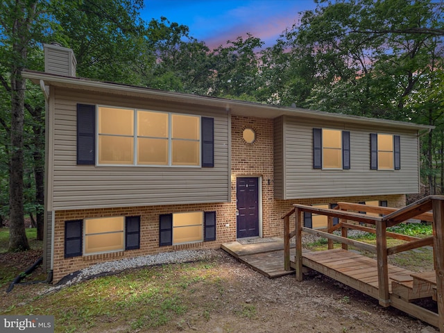 237 Lakeview Dr, Cross Junction, VA 22625 - raised ranch with a chimney and brick siding