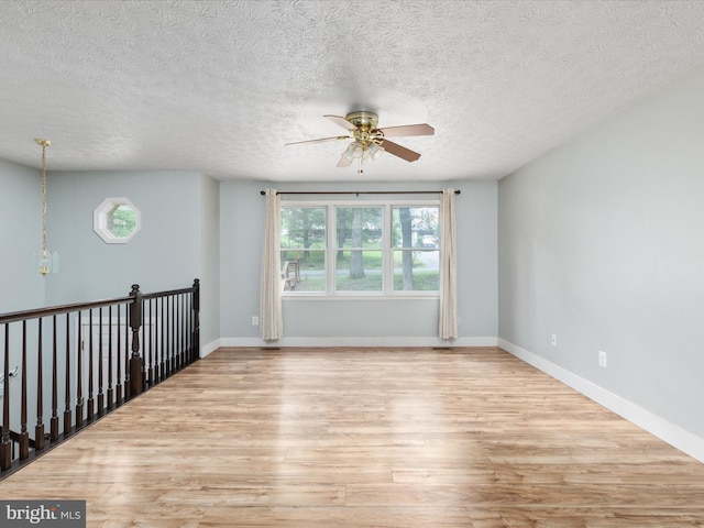 237 Lakeview Dr, Cross Junction, VA 22625 - empty room with ceiling fan, wood finished floors, and a textured ceiling
