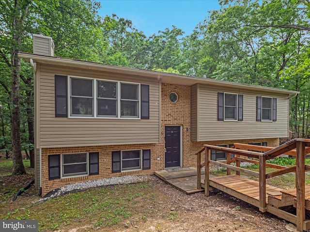 237 Lakeview Dr, Cross Junction, VA 22625 - raised ranch with brick siding and a chimney