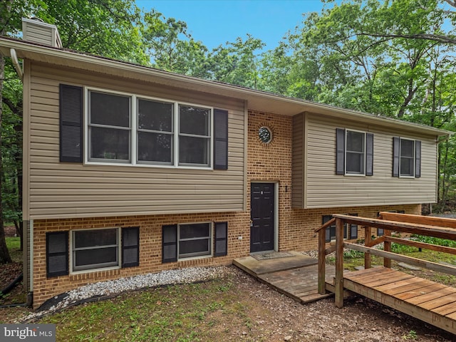 237 Lakeview Dr, Cross Junction, VA 22625 - raised ranch with brick siding and a chimney